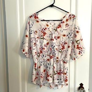 Lightweight floral peplum top